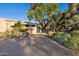 Landscaped front yard with cacti and desert plants at 3044 Ironwood Rd, Carefree, AZ 85377