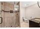 Clean bathroom with large shower and dark vanity at 3044 Ironwood Rd, Carefree, AZ 85377
