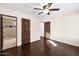 Spacious bedroom with hardwood floors and private bathroom access at 3044 Ironwood Rd, Carefree, AZ 85377