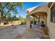 Flagstone patio with desert landscaping, leading to a pool and spa at 3044 Ironwood Rd, Carefree, AZ 85377