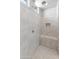 Large walk-in shower with built-in seat and window at 21931 N 30Th St, Phoenix, AZ 85050