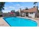 Large swimming pool in the backyard with plenty of space for sunbathing at 19049 N 5Th Ave, Phoenix, AZ 85027