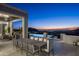 Outdoor patio dining area with stunning sunset views at 20958 N 112Th St, Scottsdale, AZ 85255