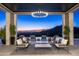 Relaxing patio with stunning sunset views, comfortable seating, and a pool at 20958 N 112Th St, Scottsdale, AZ 85255
