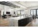 Gourmet kitchen boasts expansive island, high-end appliances, and ample cabinetry at 20958 N 112Th St, Scottsdale, AZ 85255