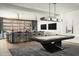 Game room with a pool table and wet bar at 20958 N 112Th St, Scottsdale, AZ 85255