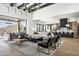 Open floor plan with hardwood floors, a comfortable seating area, and kitchen views at 20958 N 112Th St, Scottsdale, AZ 85255