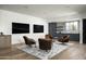Relaxing recreation room with leather armchairs and wet bar at 20958 N 112Th St, Scottsdale, AZ 85255