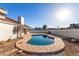 Landscaped backyard oasis with a sparkling pool at 15274 N 63Rd Ln, Glendale, AZ 85306