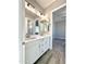 Double vanity bathroom with modern fixtures and tile flooring at 1716 W Lucky Ln, Queen Creek, AZ 85144