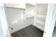 Large walk-in closet with shelves and hanging rods at 1716 W Lucky Ln, Queen Creek, AZ 85144