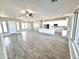 Open floor plan with large living area and adjacent kitchen at 1716 W Lucky Ln, Queen Creek, AZ 85144