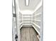 Walk-in pantry with ample shelving for food storage at 1716 W Lucky Ln, Queen Creek, AZ 85144