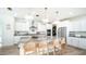 Kitchen island with seating for four, perfect for entertaining at 13827 W Forest Pleasant Pl, Peoria, AZ 85383