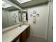 Clean bathroom with single sink vanity and shower/tub combo at 3927 N Indiana Ave, Florence, AZ 85132