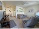 Spacious living room with open kitchen view and seating area at 3927 N Indiana Ave, Florence, AZ 85132