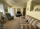 Living room features a sofa, recliner, and TV stand at 3927 N Indiana Ave, Florence, AZ 85132