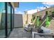 Private patio with comfortable seating and lush greenery at 377 E Windsor Ave # 21, Phoenix, AZ 85004