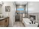 Spa-like bathroom with soaking tub and walk-in shower at 377 E Windsor Ave # 21, Phoenix, AZ 85004