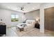Spacious bedroom with a large bed and exposed brick wall at 377 E Windsor Ave # 21, Phoenix, AZ 85004
