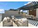 Rooftop deck with dining and seating areas, perfect for entertaining at 377 E Windsor Ave # 21, Phoenix, AZ 85004
