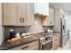 Modern kitchen with gas cooktop and ample cabinetry at 377 E Windsor Ave # 21, Phoenix, AZ 85004