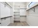 Large walk-in closet with ample shelving and hanging space at 377 E Windsor Ave # 21, Phoenix, AZ 85004