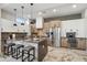 Modern kitchen with marble countertops, stainless steel appliances, and wood cabinets at 377 E Windsor Ave # 21, Phoenix, AZ 85004