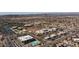 Aerial view of community, showing homes, park, and mountain views at 29031 N 69Th Dr, Peoria, AZ 85383