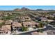 Aerial view showcasing a house and surrounding neighborhood at 29031 N 69Th Dr, Peoria, AZ 85383