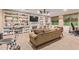 Spacious living room with fireplace and built-in shelving at 13506 W Earll Dr, Avondale, AZ 85392