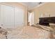 Spacious bedroom with large closet and flat-screen TV at 13506 W Earll Dr, Avondale, AZ 85392