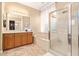 Spa-like bathroom with soaking tub, shower, and dual sinks at 13506 W Earll Dr, Avondale, AZ 85392