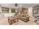 Open living room with comfortable seating and high ceilings at 13506 W Earll Dr, Avondale, AZ 85392