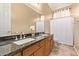 Bathroom boasts double sinks and granite countertops at 13506 W Earll Dr, Avondale, AZ 85392