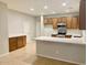 Modern kitchen with stainless steel appliances at 15685 W Mackenzie Dr, Goodyear, AZ 85395