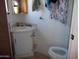 Bathroom with toilet and pedestal sink at 201 S Greenfield Rd # 197, Mesa, AZ 85206