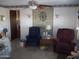 Living room with two armchairs and a side table at 201 S Greenfield Rd # 197, Mesa, AZ 85206