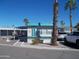 Charming mobile home with mature palm trees at 201 S Greenfield Rd # 197, Mesa, AZ 85206