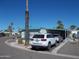 Mobile home exterior with carport and landscaping at 201 S Greenfield Rd # 197, Mesa, AZ 85206