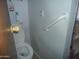 Toilet and grab bar in a bathroom at 201 S Greenfield Rd # 197, Mesa, AZ 85206