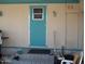 Teal exterior door leading to covered patio at 201 S Greenfield Rd # 197, Mesa, AZ 85206