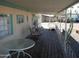 Covered porch with seating area and community view at 201 S Greenfield Rd # 197, Mesa, AZ 85206