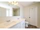 Bathroom with double vanity, and large mirror at 409 E Saddle Way, San Tan Valley, AZ 85143