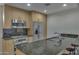 Modern kitchen with stainless steel appliances and granite countertops at 7121 E Rancho Vista Dr # 4004, Scottsdale, AZ 85251