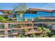 Modern building exterior with lush landscaping and balconies at 7121 E Rancho Vista Dr # 4004, Scottsdale, AZ 85251