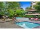 Resort-style pool with patio furniture and grilling station at 7121 E Rancho Vista Dr # 4004, Scottsdale, AZ 85251