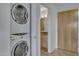 Stackable washer and dryer in a laundry closet at 7121 E Rancho Vista Dr # 4004, Scottsdale, AZ 85251