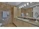 Modern bathroom with double vanity and marble countertop at 7121 E Rancho Vista Dr # 4004, Scottsdale, AZ 85251