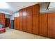 Garage with extensive built-in storage cabinets at 41906 W Solitare Dr, Maricopa, AZ 85138